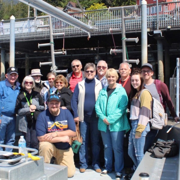 a group of people taking a photo in Ketchikan